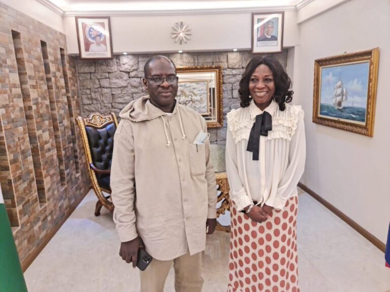Ambassador Akinleye with the head of the passport delegation.